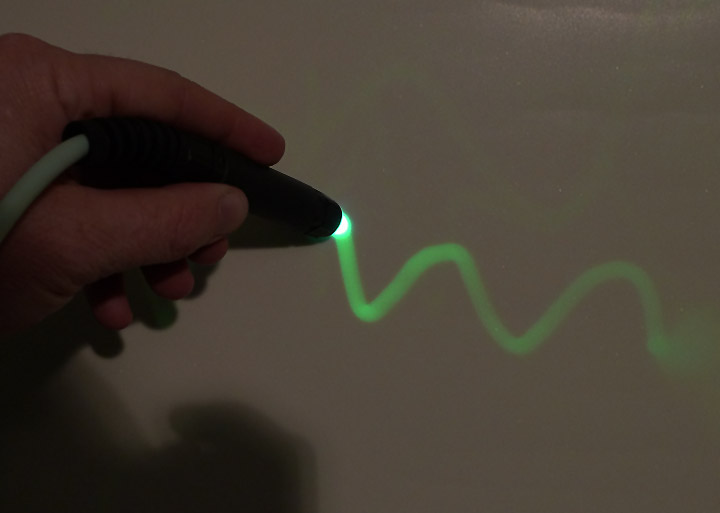 glow in the dark light pen interactive exhibit.jpg